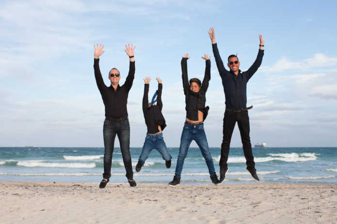 Family jumping Miami Beach