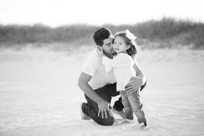 Daughter hugging father Miami Beach