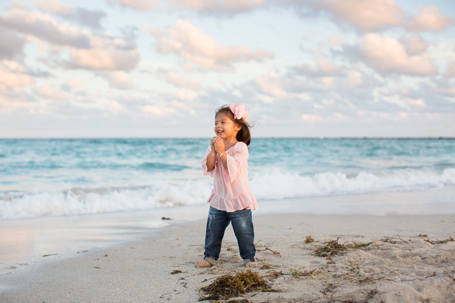 Girl playing Miami Beach ocean