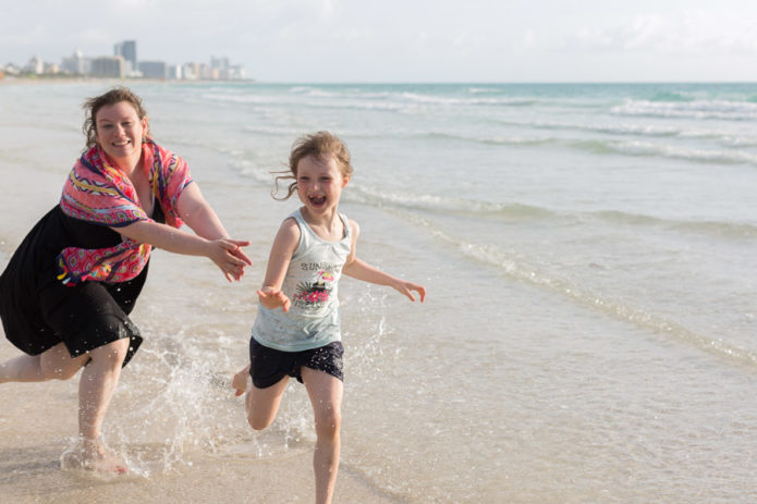 Family of three sunrise beach photo session miami