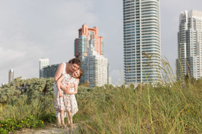 Family of three sunrise beach photo session miami