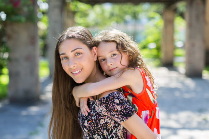 Sisters at the Coral Gables Prado Entrance