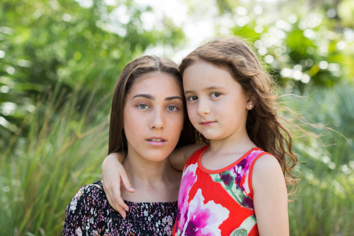 Sisters at the Coral Gables Prado Entrance