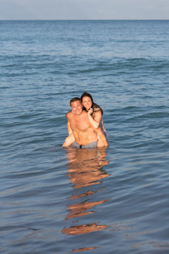 couple in water miami sunset