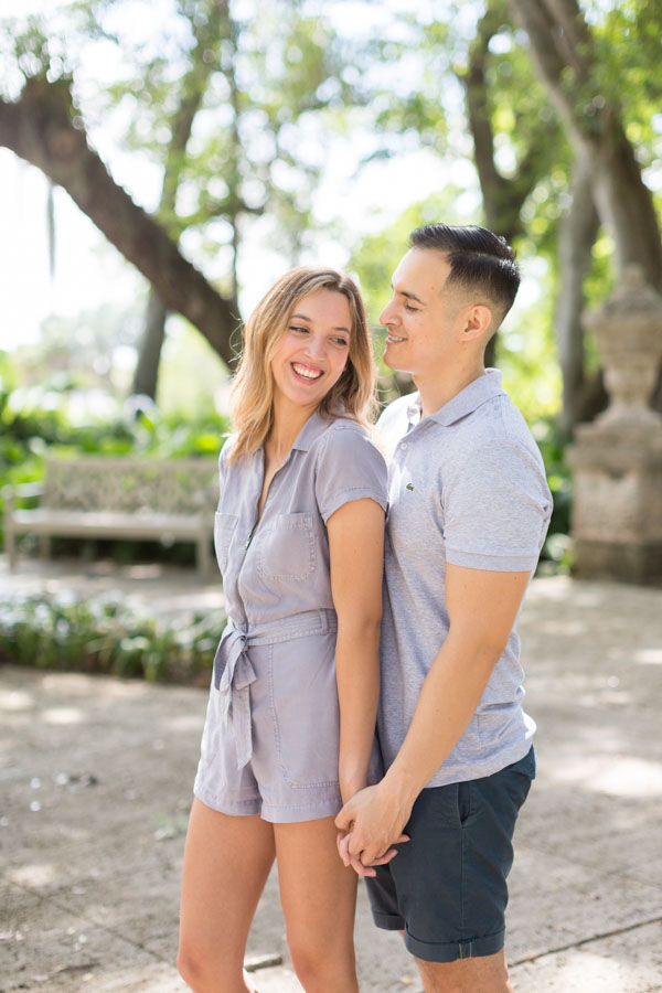 couple laughing holding hands
