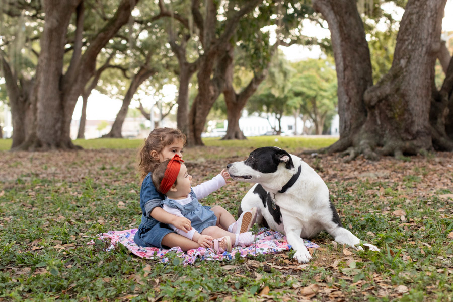 sisters with their dog