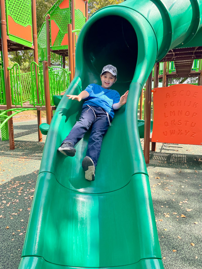 nephew going down slide